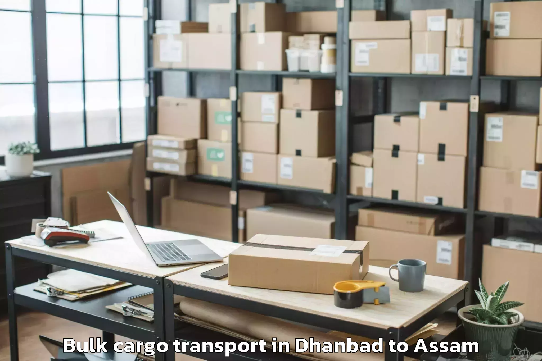 Book Dhanbad to Dhakuakhana Pt Bulk Cargo Transport Online